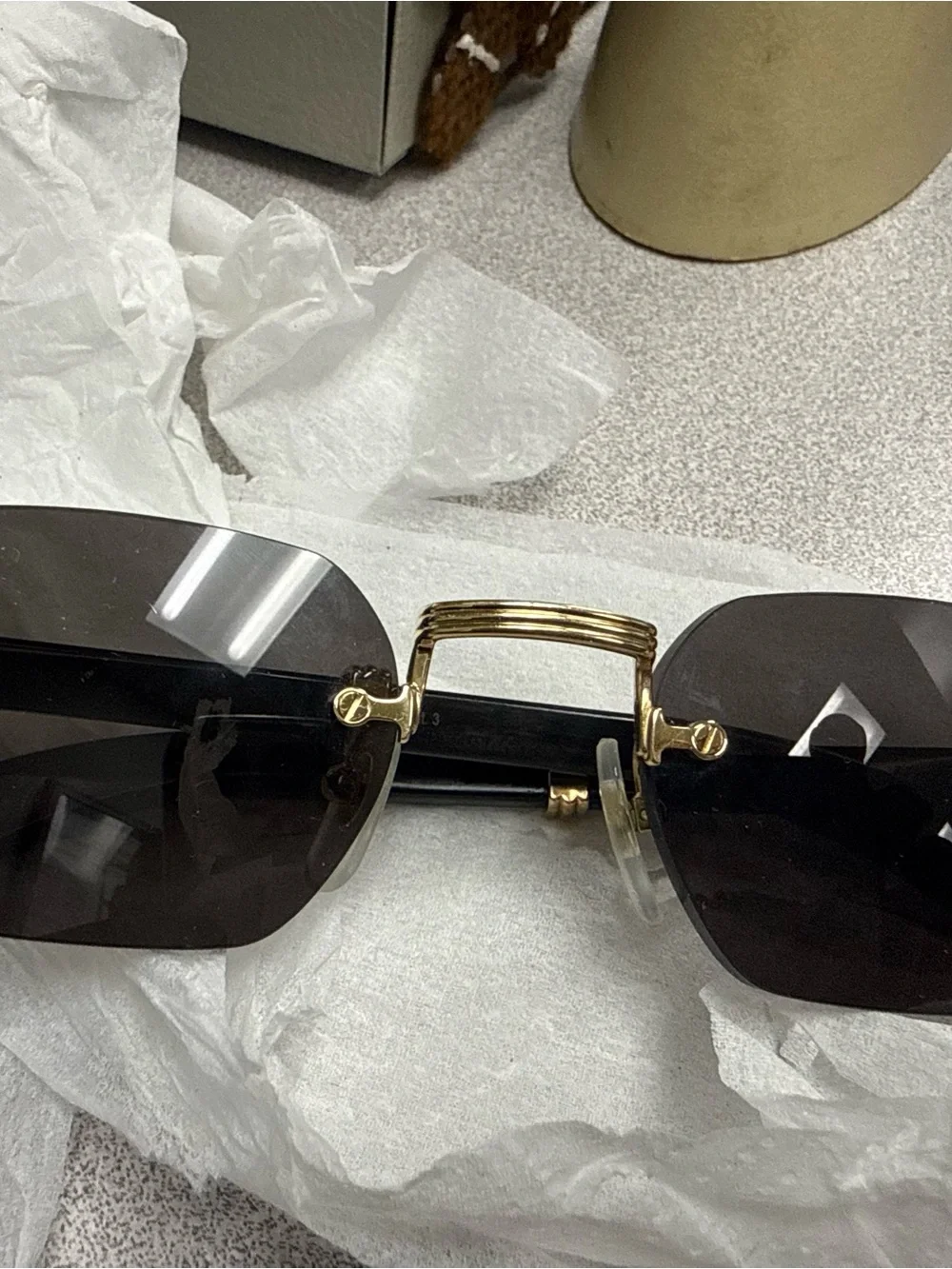 Cartier Gold Bridge Black Lens Rimless Sunglasses